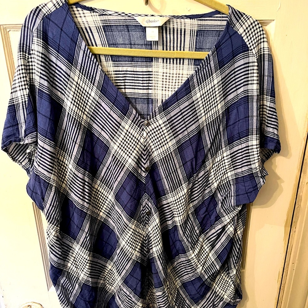 A blue plaid CJ Banks top with capped sleeves, button up, and tie at the bottom.